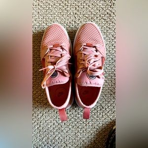 Platform Nike shoes, size 8.5.